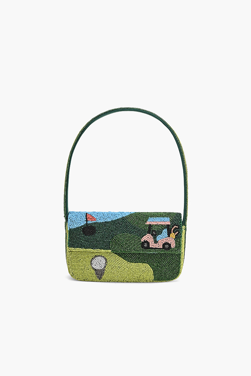 Handbag with golf-themed design on a white background