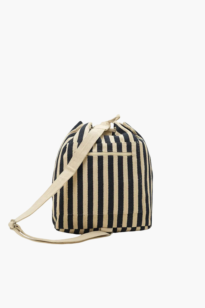 Black and white striped bag with a strap on a white background