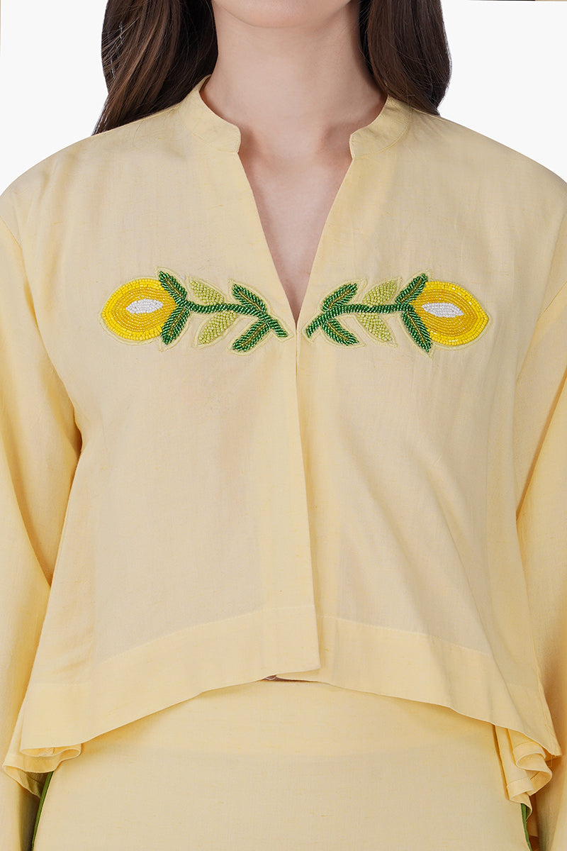 Lemonade Embroidered Yellow Flared Top